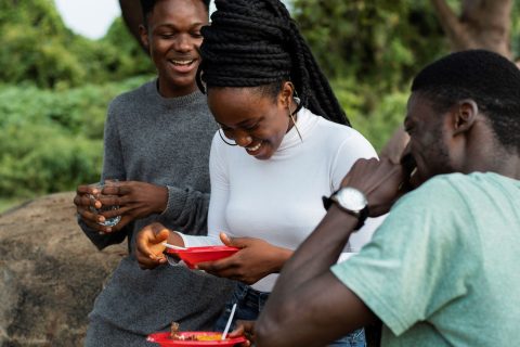 side-view-people-having-lunch-outside