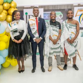 di and CIPS Education Partnerships Manager Mr Siphiwe Mahlangu with IDM Staff pose for a picture